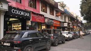 GK M Block Market street stalls and shoppers