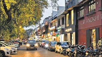 Khan Market tree-lined shopping street with boutiques